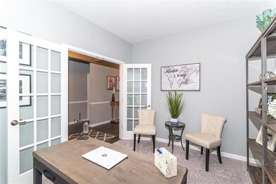 Office with glass french doors