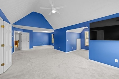 The primary suite is MASSIVE with a sitting area, spacious bathroom, and walk-in closet!