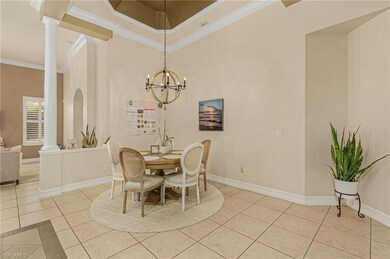 Dining area featuring crown molding, decorative co