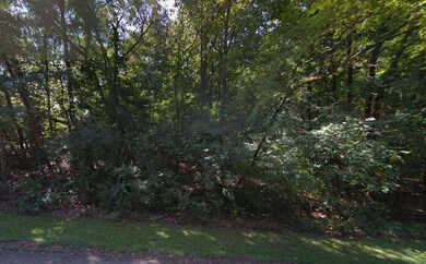 Perfect location to build a new home. Trees, front