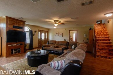 View of stairs from living room
