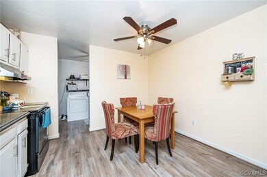 Kitchen with view of laundry room