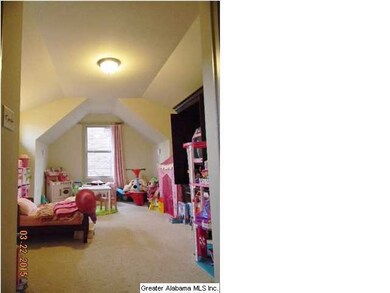 Bedroom 4 is HUGE with Accent Windows and Built In