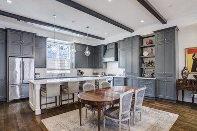 Alternate view of dining and kitchen showcasing th