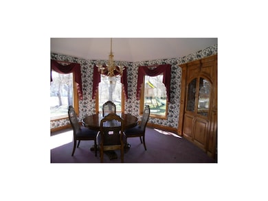 Built-in china cabinet.  Dine with nice views!