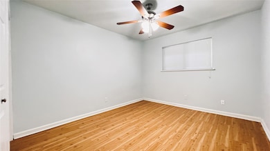 Unfurnished room featuring light wood-style floor