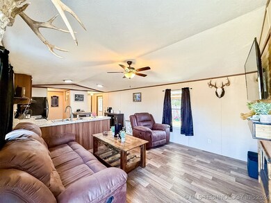 OPEN CONCEPT LIVING AND DINING/KITCHEN AREA