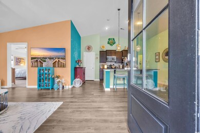 Interior space with lofted ceiling, hardwood / woo