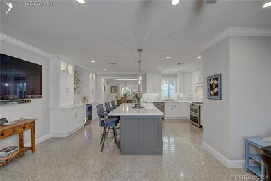 View of beautiful kitchen from inside front door w