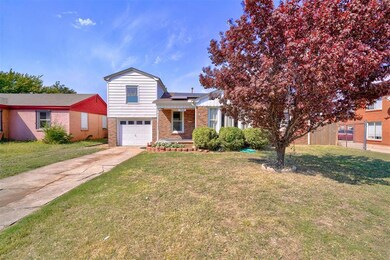 View of front of house featuring a front yard and 