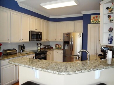 Awesome updated Kitchen with beautiful granite counters, stainless appliances and lots of cabinets