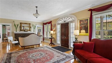 Grand Entryway with wood burning fireplace