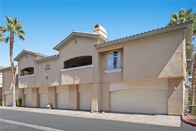View of front of property featuring a chimney, an