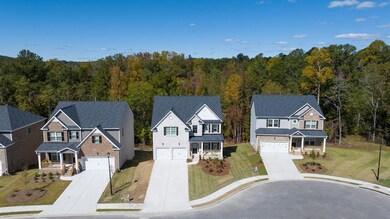 View of front of house with a porch, concrete driv