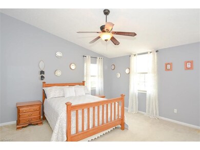 Spacious Master Bedroom with vaulted ceiling.