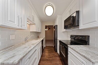 Lots of prep space and storage in this beautifully updated kitchen.