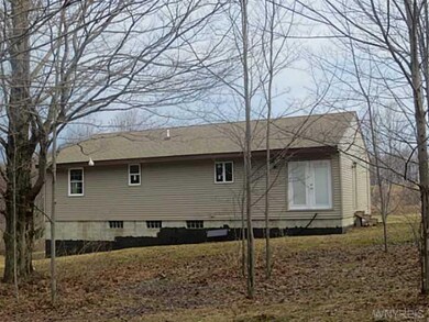 Exterior Back. Back view of house . French doors a