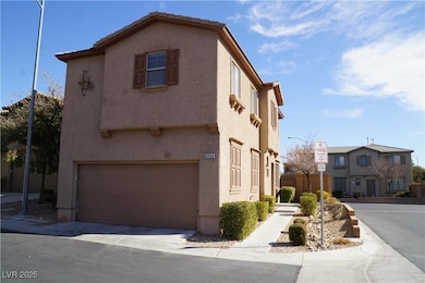 View of front of property featuring an attached ga