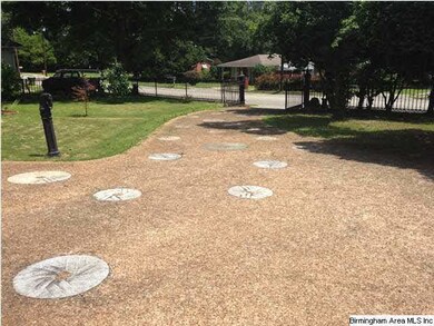 Grist mill stones poured into the driveway are jus