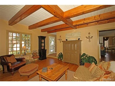 Exposed beams and hardwoods along with exposed woo