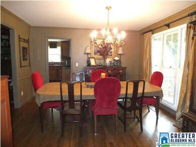 The formal dining room is located at the front of 