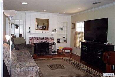 Formal Front Living Room w/ Cozy Fireplace and Rec