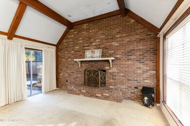 GREAT ROOM W/ VAULTED CEILING & BEAMS