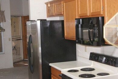 KITCHEN LOOKING OUT TO DINING ROOM