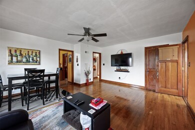 Hardwood flooring throughout living room and most