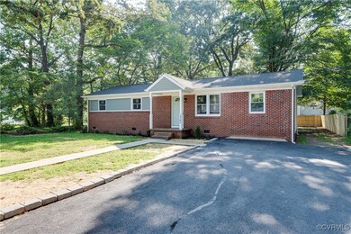 View of front of house featuring a front lawn