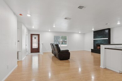 Entrance foyer featuring light wood-style floorin