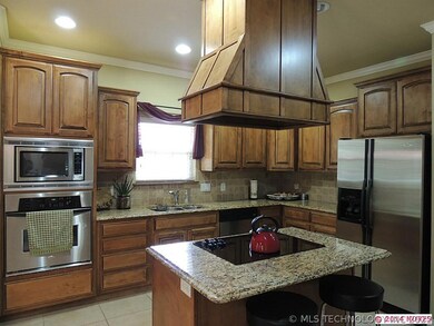 The Kitchen opens to the breakfast nook with direc