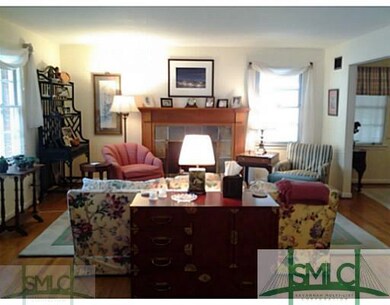 Living Room. Hardwoods and Gas Log Fireplace Make 