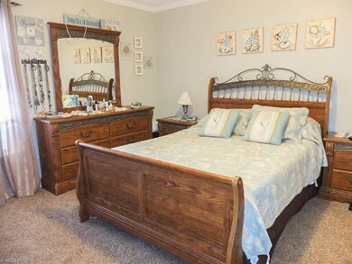 Bedroom 1 with crown molding.