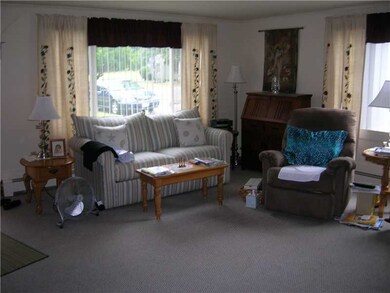 Living Room. FRONT APARTMENT