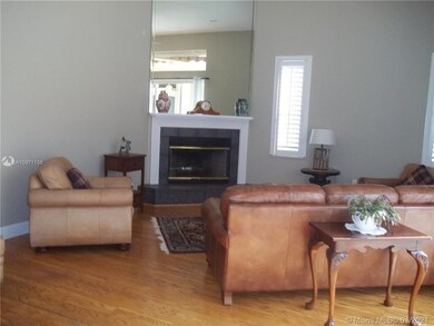 Woodburning fireplace in family room.