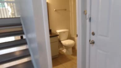 Bathroom featuring vanity and tile patterned floors