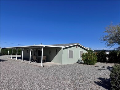 Rear view of house with a patio