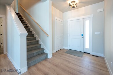 Entry way, stairs to bonus room.