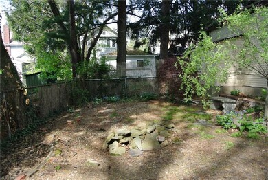 Area behind the garage could be perfect for a fire