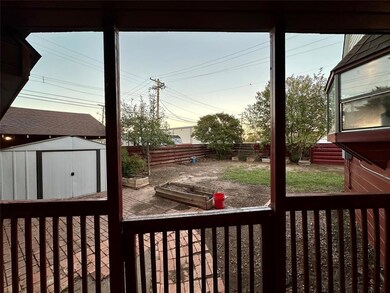 Deck at dusk with a shed