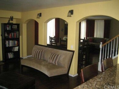 FAMILY ROOM OPENED TO FORMAL DINING ROOM