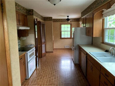 Very convenient kitchen is waiting for some one to cook up a storm!