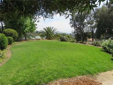 View of gorgeous lawn and surrounding foothills fr