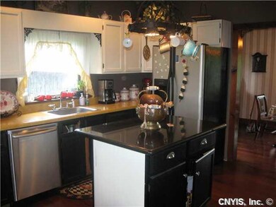 Kitchen. The kitchen leads into your formal dining