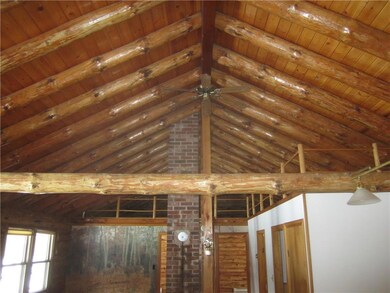 Real logs add to the ceiling appeal