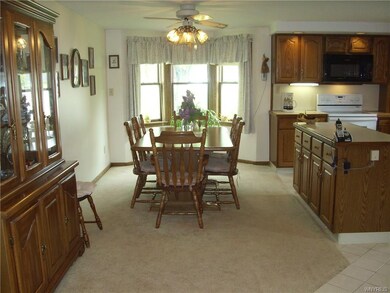 Open Kitchen with Bow Window.