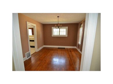 Dining Area. Dining room, hardwood floors, warm wi