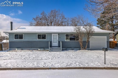 Ranch-style house with a garage