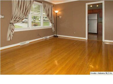 Living room with original hardwood floors